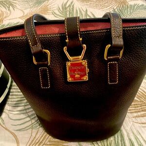 Dooney & Bourke Brown Bucket Leather Hobo Bag
Gold Hardware 
Inside Zip Pocket